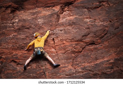 Climbing Red Rock In Moab