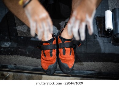 Climbing Shoes And Hands Covered With White Magnesium Powder