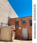 Climbing up the side of the building 