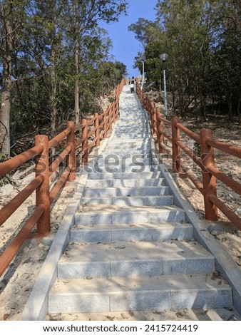 Climbing steps, growth concept, climbing road, long stairs, woods, sky,chinese mountain Climbing steps