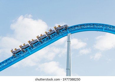 Climbing a trolley with people on a roller coaster before an extreme descent - Powered by Shutterstock