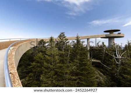 Clingmans Dome is located in the Great Smoky Mountains National Park in North Carolina with a circular lookout tower with panoramic views and an elevation of 6,643 feet.