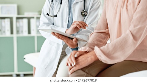 Clinic, tablet and hands of doctor with patient for consulting, medical service and help in hospital. Healthcare, telehealth and people on digital tech for diagnosis, online results and insurance - Powered by Shutterstock