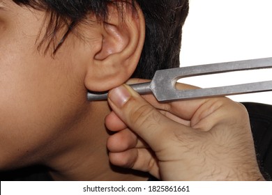 Clinical Instrument Tuning Fork Used To Perform Sound Test On Patient