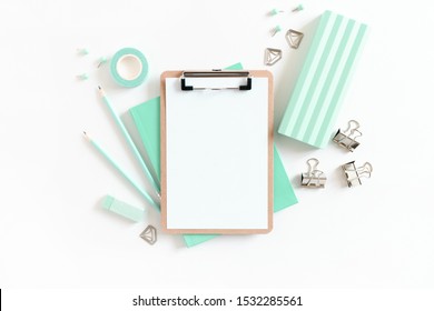 Clipboard mockup and set of mint stationery 