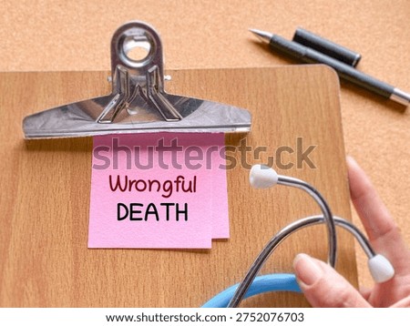Clipboard with wrongful death note and stethoscope representing medical malpractice lawsuit and healthcare legal claim concept.