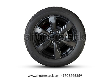 Clipping path. Black Wheel super car isolated on White background view. Movement. Magneto wheels.