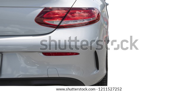 clipping path. Focus of Luxury car Tail\
light and Rear bumper. Isolated on white\
background.