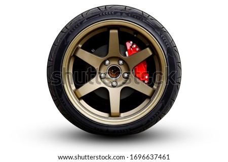Clipping path. Gold Matt Wheel Speed super car isolated on White background view. Movement.