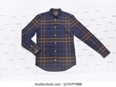 clipping path, top view of folded yellow and blue color long sleeve plaid shirt isolated


 - Powered by Shutterstock