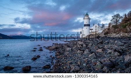 The Cloch lighthouse is on the shore of the Firth of Clyde, Scotland. It is situated low down on the E shore of the Firth of Clyde a short distance SW of Cloch Point.