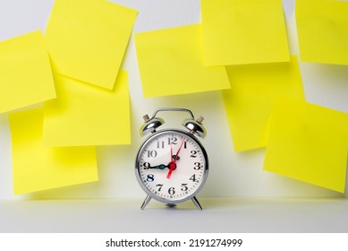 A Clock Along With A Series Of Yellow Sticky Notes To Include Goals, Reminders, Important Dates Or Birthdays. Time To Remember Things