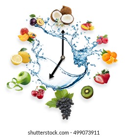 Clock Arranged From Healthy Fruits Splash By Water Isolated On White Background. Food Clock With Fruits. Healthy Food Concept.