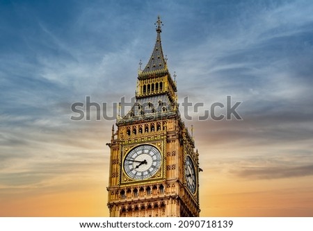 Clock of Big Ben tower at sunset, London, UK