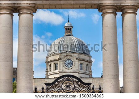 The clock and the dome of the Government Buildings - Tithe an Rialtais in Dublin, Ireland.