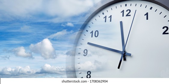 Clock Face In Blue Sky. Time Passing