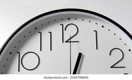Clock face emerging from shadows, marking time and the rhythm of life