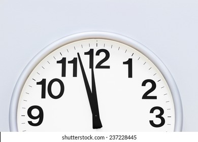 Clock hanging at the wall with copy space.