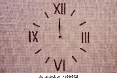 Clock made of coffee beans. Twelve o'clock - Powered by Shutterstock