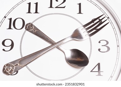 Clock made of spoon and fork