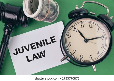 Clock, Money And Judge Gavel And White Paper Written With JUVENILE LAW