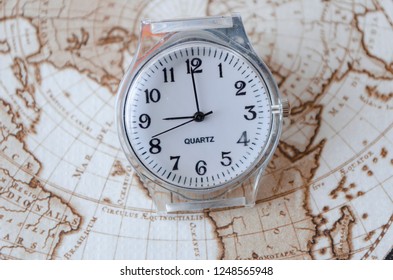 clock on the background of the map