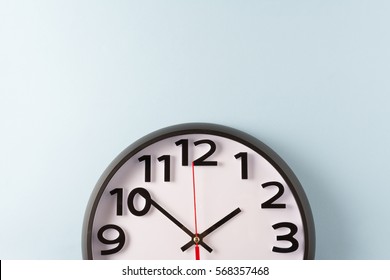 Clock On Blue Wall