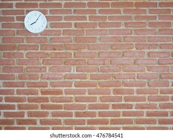 Clock on brick wall