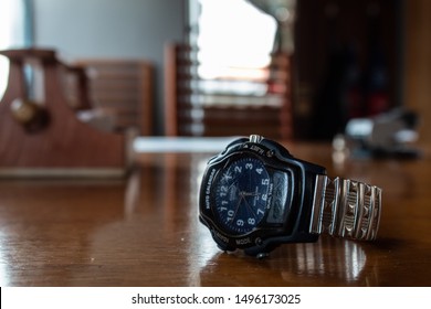 
clock on a brown table 