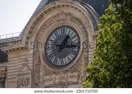 Clock on the facade of the current Musee d'Orsay of Paris, formerly the Orsay train station