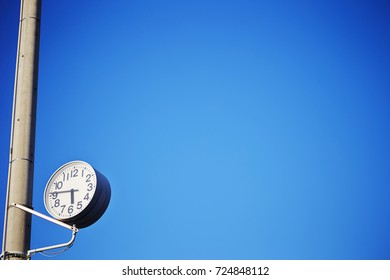 Clock on pole 