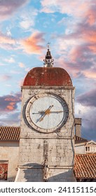 Clock on the tower of the main square of Trogir., a popular tourist destination in Croatia.