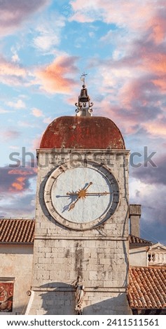 Clock on the tower of the main square of Trogir., a popular tourist destination in Croatia.