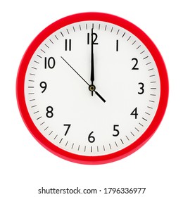 Clock on a white isolated background shows 12 o'clock on New Year's Eve - Shutterstock ID 1796336977