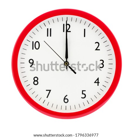 Clock on a white isolated background shows 12 o'clock on New Year's Eve