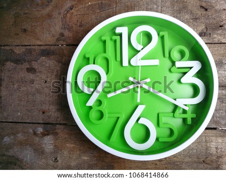 https://image.shutterstock.com/image-photo/clock-on-wooden-background-time-450w-1068414866.jpg