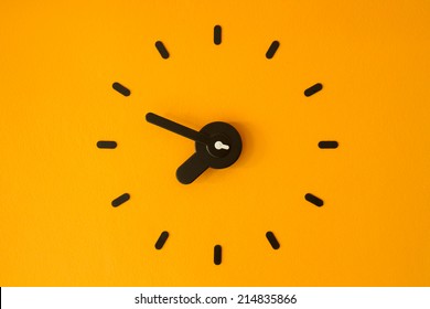 Clock on yellow wall