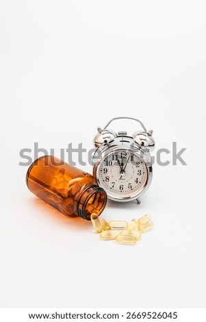 Clock and Pills Representing Medication Timing and Healthcare Concepts