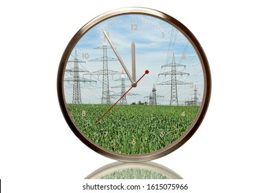 Clock with power poles, 5 minutes to twelve, eleventh hour, symbolic image for expansion of electricity networks