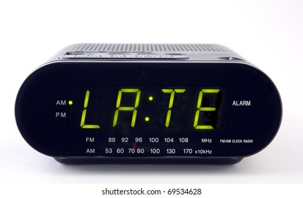 A Clock Radio With The Word LATE