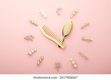 Clock shape made of comb, brush and hair clips on pink background, flat lay