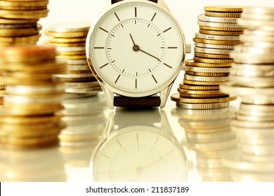  Clock And Stacks Of Coins : Time - Money