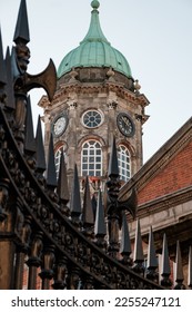 Clock tower behind metal gate, Dublin, Ireland.