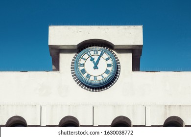 Clock tower. Close up of a clock in the tower of a building