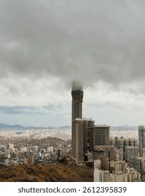 clock tower hide in heavy clouds and dark weather click on mountain beautiful view and wallpaper