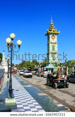 Clock tower at Mahamuni Pagoda complex in Mandalay, Myanmar. Mahamuni Pagoda is a Buddhist temple and major pilgrimage site in Myanmar.