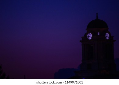 A clock tower at night