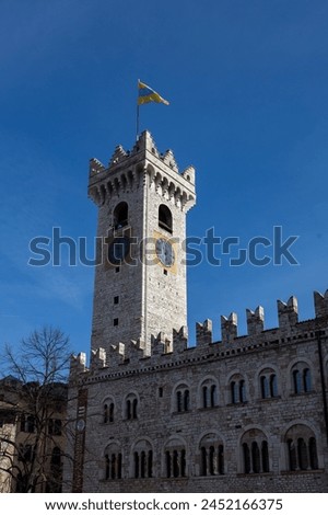 Clock Tower (Torre Civica) and Palazzo Pretorio in the historic center of Trento, Italy