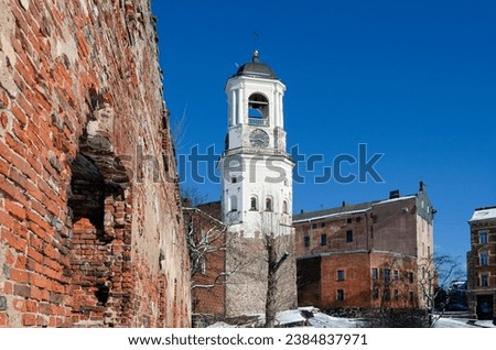 The Clock Tower is a tower in Vyborg. View of the tower on a sunny winter day with a clear sky.