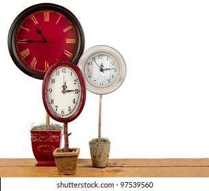 Clocks On A Topiary, Making More Time Concept.